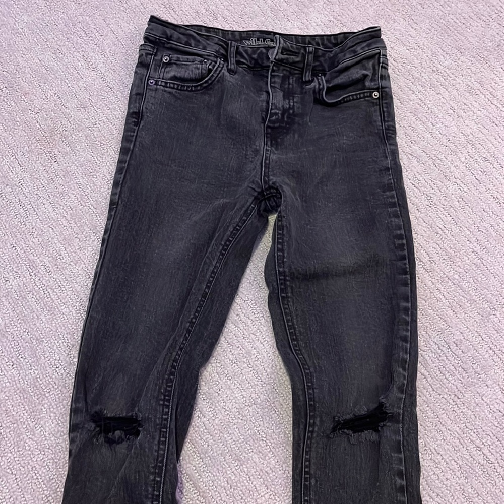 Trendy black ripped jeans